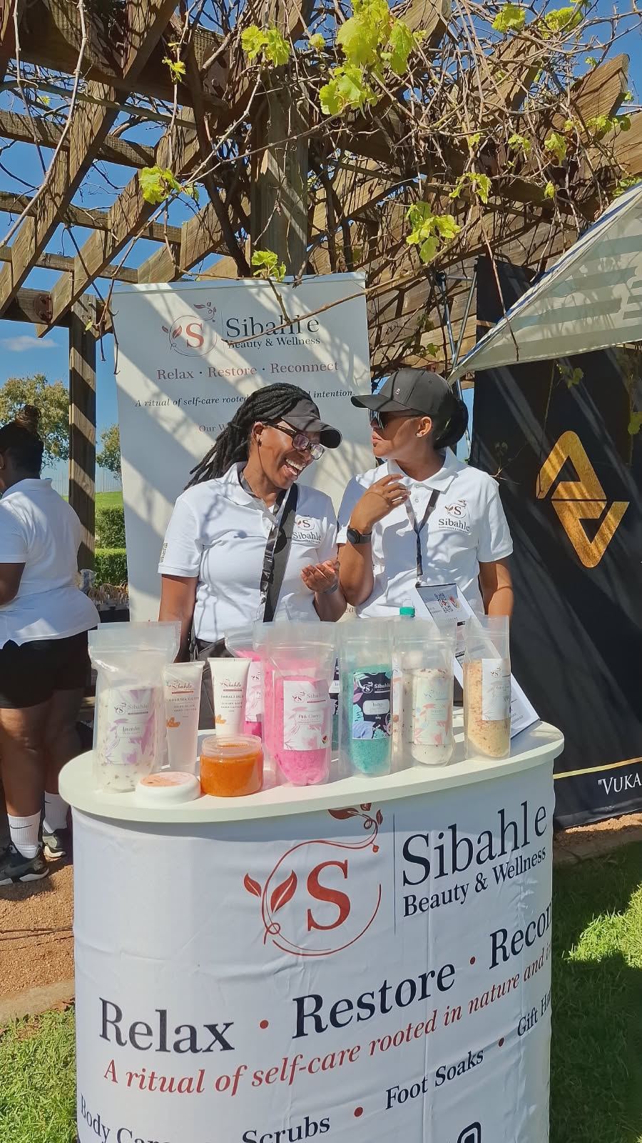 Sibahle team members at an exhibition booth